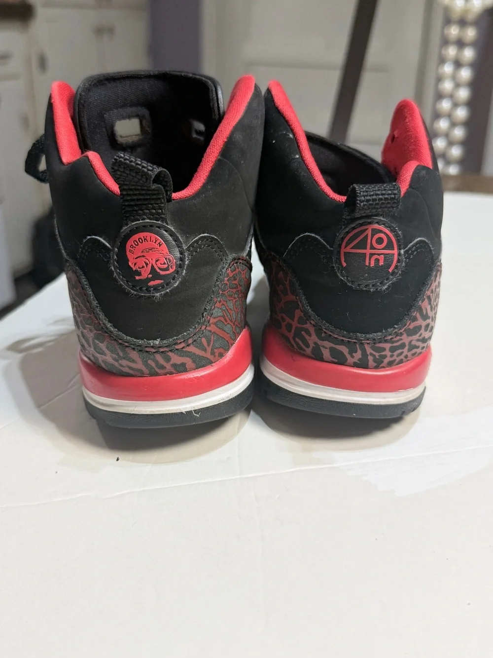 Jordan kid’s black & red high-top sneakers Boy’s size 2Y